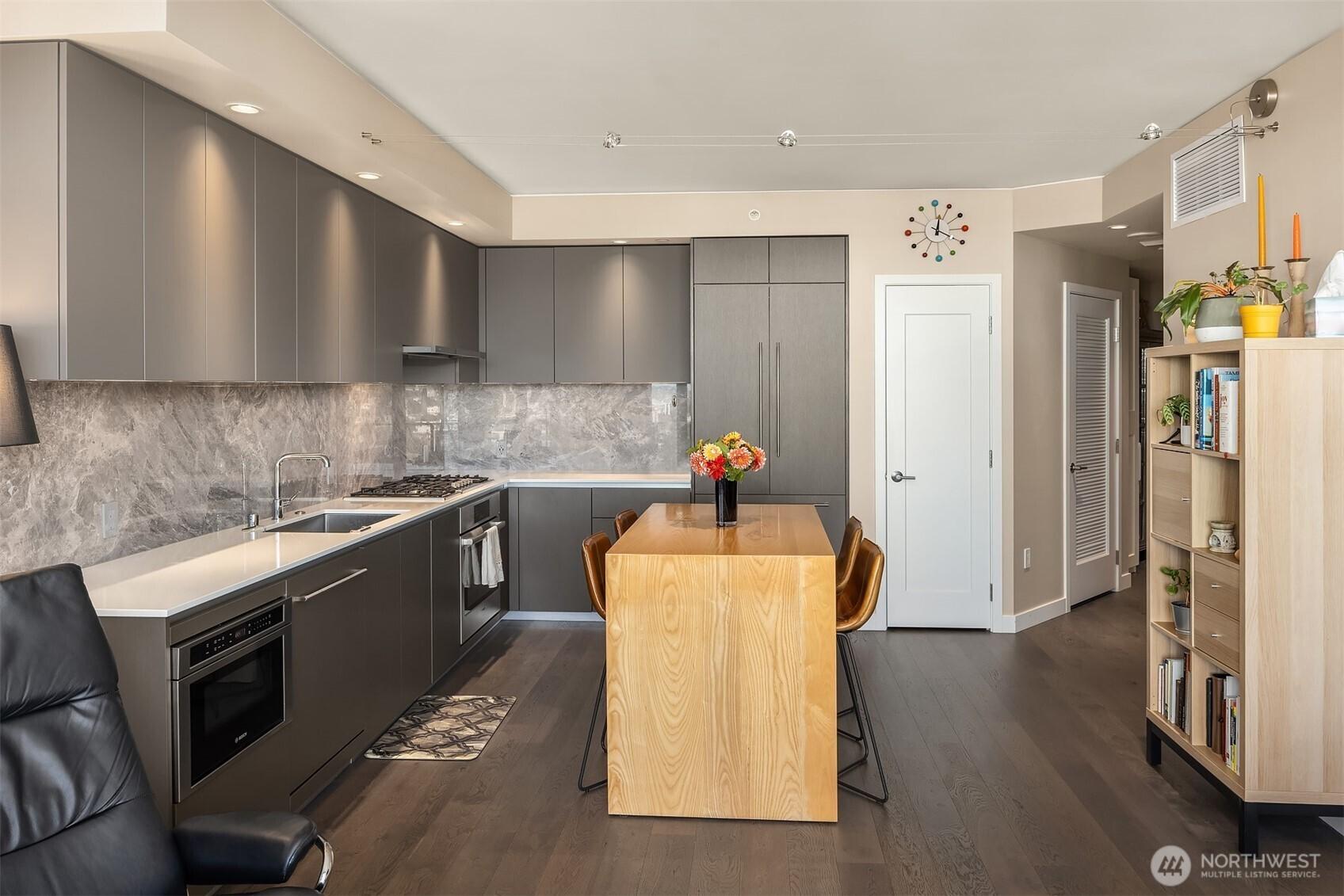Note the pantry door on the right. This kitchen has wonderful storage.