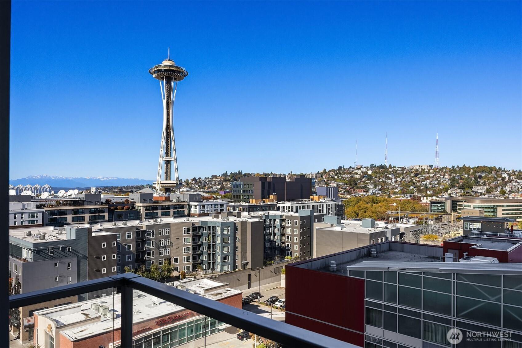 Incredible Space Needle view from balcony, living room and bedroom.