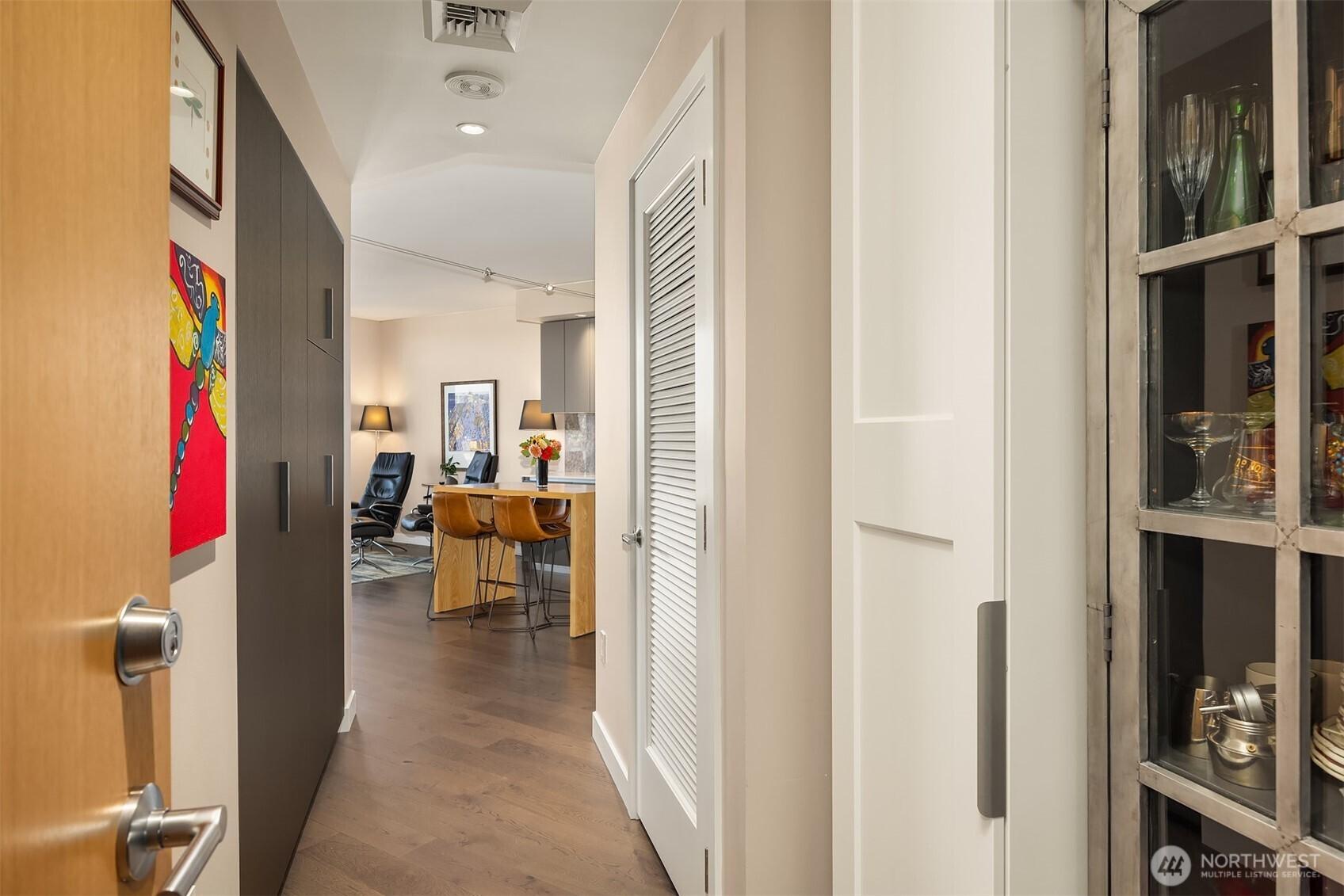 Wonderful entry with lots of custom built-in storage.